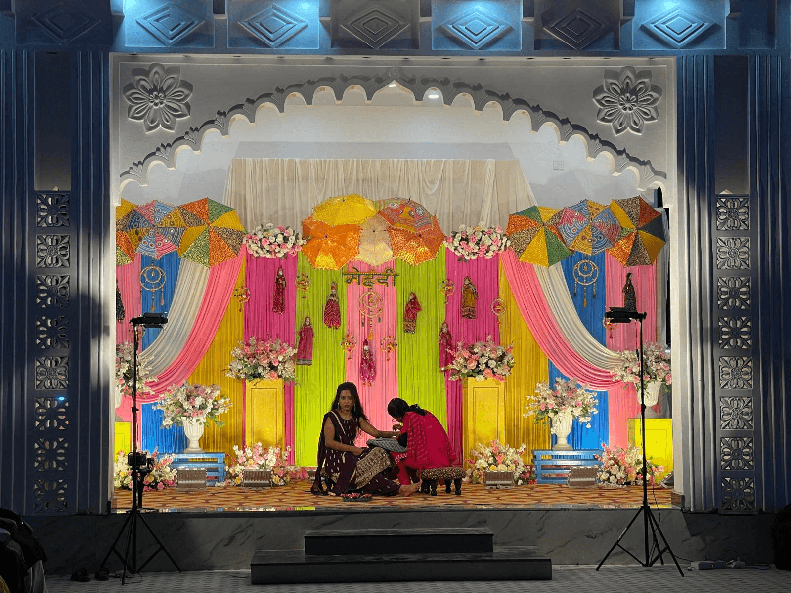 Colorful mehndi ceremony stage at Rosella Celebration City